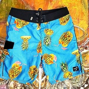Vans mens swim trunks pineapple skulls pri…
